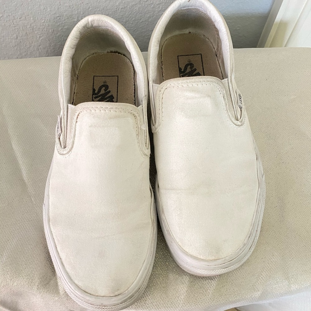 White slip ons from Vans